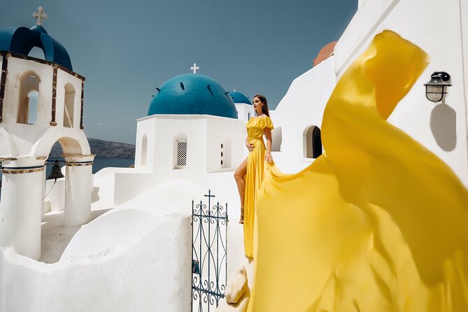 1-Hour Private Santorini Flying Dress Photoshoot - The Oia Stop: Blue Domed Churches and the Old Castle Area Feel
