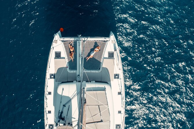 Beautiful Day Catamaran Caldera Cruise incl. Meal & Drinks - A 5-Hour Santorini Catamaran Day from Ammoudi