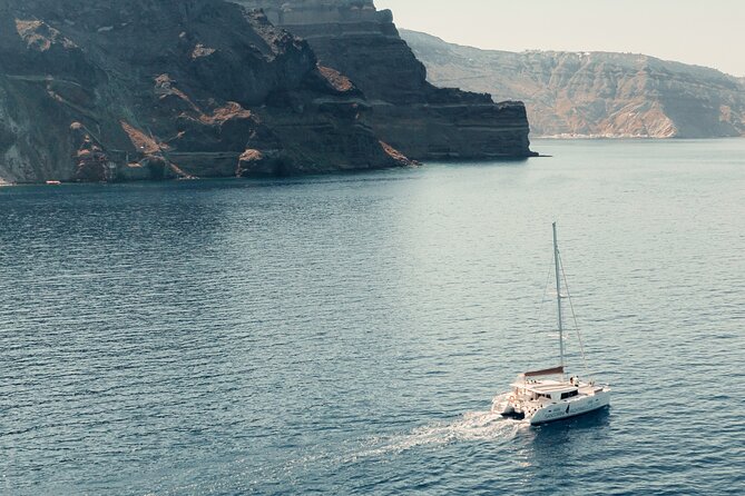 Beautiful Day Catamaran Caldera Cruise incl. Meal & Drinks - Stop 1: Volcano Sailing and the Hot Springs Swim