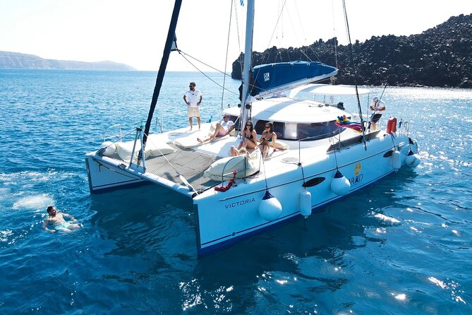 Best of Santorini Private Half-Day Catamaran Cruise with transfer and meal - White Beach: sea-only access and a calmer photo pause