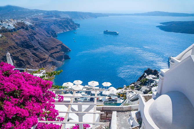 Discover Santorini in a Day- Private Tour 6 hours - Perissa’s black beach: volcanic color and rock formations