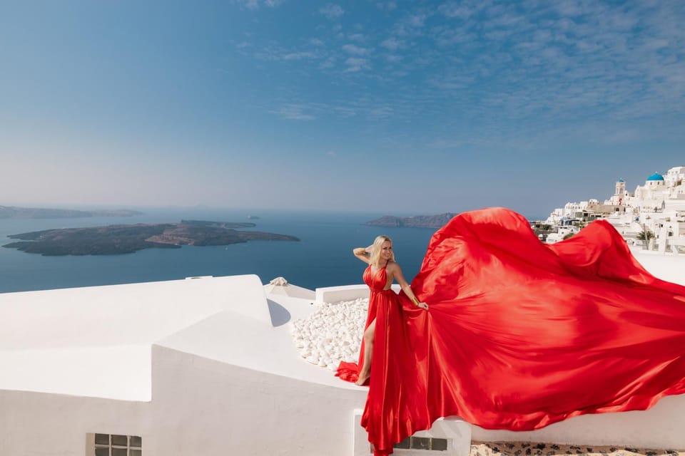 Flying dress Photoshoot in Santorini with Hotel Pickup - Imerovigli Backdrops: White Houses, Blue Domes, and Caldera View Magic