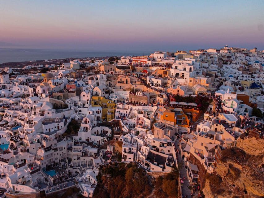 From Fira: Santorini Highlights Minibus Tour with Oia Sunset - Firostefani Blue Domes: The Short Walk That Delivers the Classic Shot