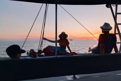 Half-Day Exclusive Catamaran Cruise in Santorini with Meal and Open Bar - Sailing past White Beach and the Venetian Lighthouse: the quiet “wow” moments