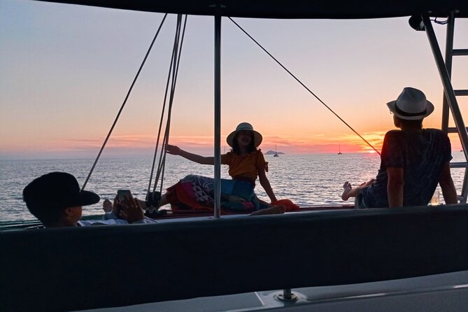 Half-Day Exclusive Catamaran Cruise in Santorini with Meal and Open Bar - Sailing past White Beach and the Venetian Lighthouse: the quiet “wow” moments