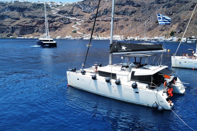 Half Day Premium Catamaran Cruise in Santorini including Oia - Entering the Santorini groove: premium catamaran, simple flow