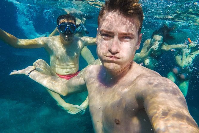 Island Hopping: Santorini Catamaran Charter Cruise with a skipper - Snorkeling gear and dinghy support: small details that shape the day
