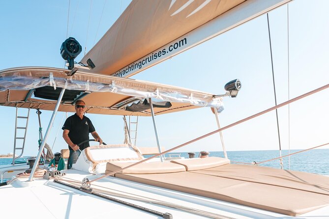 Luxury Santorini Catamaran Cruise: Lunch, BBQ, Drinks, Transfers - Mesa Pigadia Beach swim stop: your first hour in clear water
