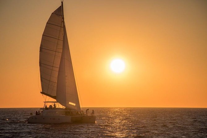 Luxury Small-Group Catamaran Cruise with BBQ, Open bar & Transfer - The route that makes Santorini feel less crowded