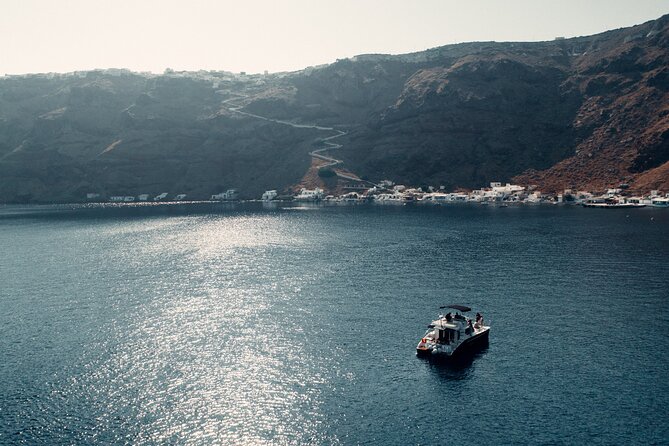 Private Caldera Cruise with Power Catamaran ENJOY incl. Meal & Drinks - Oia’s old fishing port: your start point and first photo set