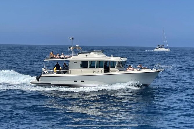 Private Full-Day Motor Yacht Cruise with Meal, Open Bar+Transfers - A private Santorini yacht day that actually works on real schedules