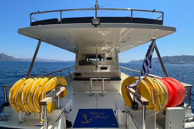 Private Full-Day Motor Yacht Cruise with Meal, Open Bar+Transfers - Sailing the caldera: Indian Rocks, Venetian Lighthouse, and Akrotiri area views