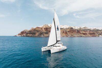 Private Morning Tour Lagoon 400-380 Sailing in Santorini ,lunch, drink, transfer - White Beach (1.5 hours): snorkeling time plus a proper onboard BBQ