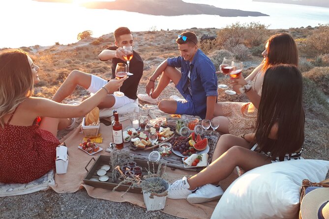 Private Santorini Sunset Picnic Experience - Panoramic views of the volcano and caldera: what to expect where you sit