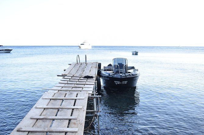 Rent a Boat in Santorini without a License - Water, snacks, snorkeling gear, and what’s included on the boat