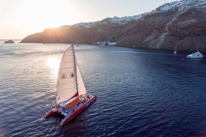 Sailing Catamaran Cruise in Santorini with BBQ, Drinks and Transfer - Red Beach Swim and White Beach Snorkel: Two Water Moments, One Lunch Day