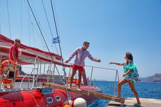 Sailing Catamaran Cruise in Santorini with BBQ, Drinks and Transfer - Snorkeling Gear, Floating Devices, and the Real Safety Picture