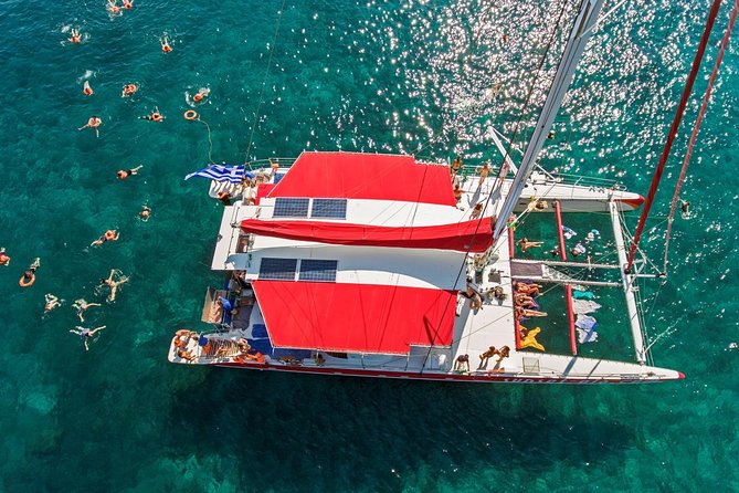 Sailing Catamaran Cruise in Santorini with BBQ, Drinks and Transfer - From Ammoudi or Athinios to the Caldera: How the Route Sets You Up