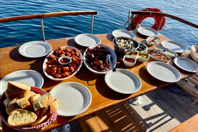 Santorini Caldera Day Traditional Cruise with Meal and Drinks - Traditional Caique Sailing vs When You Might Sail by Catamaran