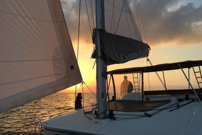 Santorini Caldera Panorama Winter Cruise All Inclusive - Sailing past Mesa Pigadia and the volcanic caldera