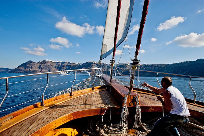 Santorini Caldera Sunset Sailing Cruise with Dinner and Wine - Sunset near Oia: how to time your photos and stay relaxed
