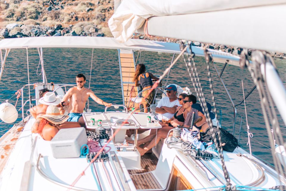 Santorini Caldera: Sunset Sailing Cruise with Meal - Dinner onboard: barbecue seafood, local wine, and an easy pace