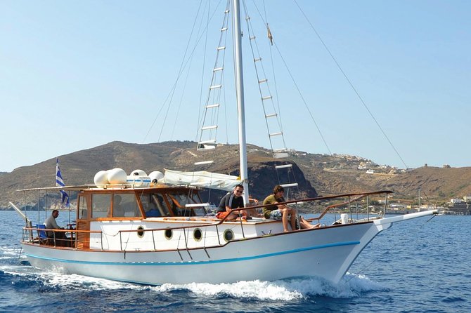 Santorini Caldera Sunset Traditional Cruise with Meal and Drinks - Sailing around the Volcano: scenery without the hike