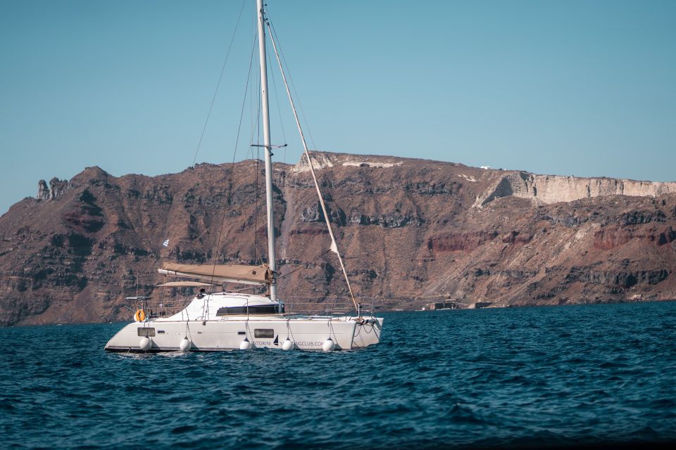Santorini: Catamaran Caldera Cruise with Meal and Drinks - Sunset Cruise: why the sea view beats the shoreline rush