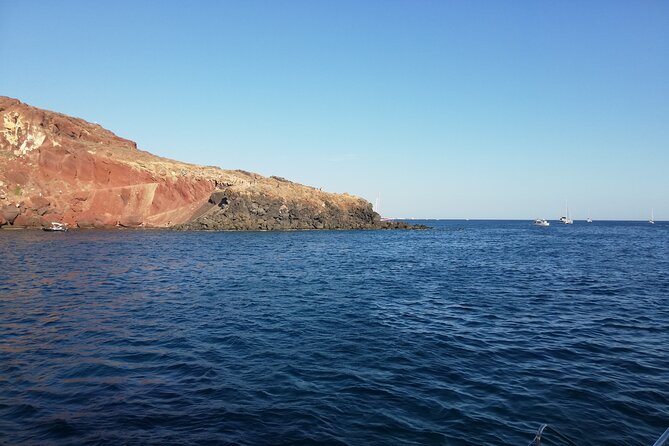 Santorini Catamaran Cruise with Fresh Meal and Open Bar - Red Beach and White Beach: the two color stops that make Santorini feel unreal
