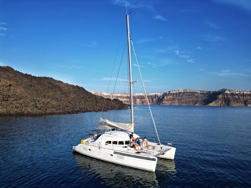 Santorini: Catamaran Cruise with Greek BBQ and Drinks - Weather, timing, and the one thing you can’t fully control