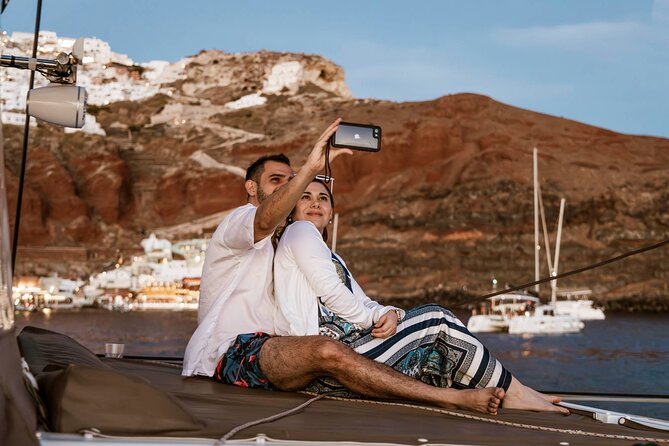 Santorini Catamaran Cruise with Greek Meal, Open-Bar and Sunset - Luxury vs classic sunset: Oia and Ammoudi without the crowds