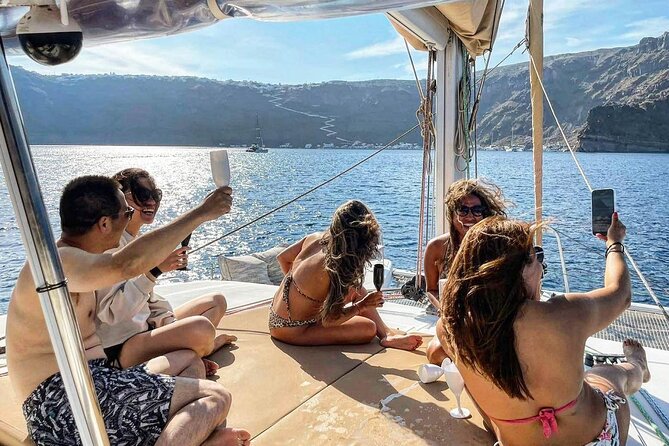 Santorini Catamaran Cruise: with Lunch, BBQ, Open Bar, Transfers - Food and open bar: what you should expect beyond the menu
