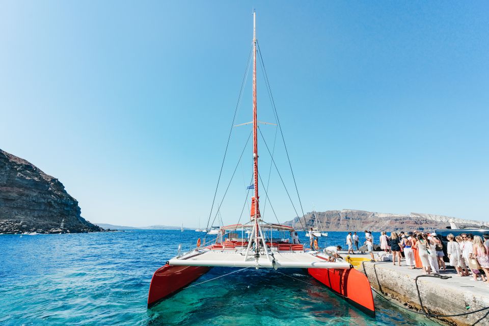 Santorini: Catamaran Tour with BBQ Dinner, Drinks, and Music - Key highlights at a glance
