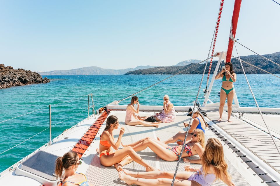 Santorini: Catamaran Tour with BBQ Dinner, Drinks, and Music - BBQ dinner with unlimited white wine: good value, not just a snack