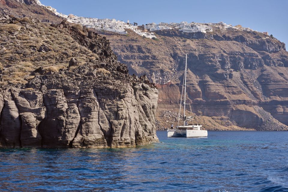 Santorini: Day Luxury Catamaran Cruise with Meal & Drinks - Should You Book Santorini Sailing Center Renieris Catamaran Cruise?