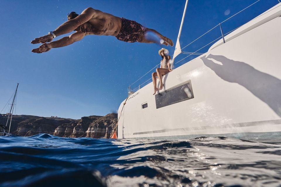 Santorini: Day Luxury Catamaran Cruise with Meal & Drinks - Nea Kameni and the Volcano Islets: BBQ After the Saltwater