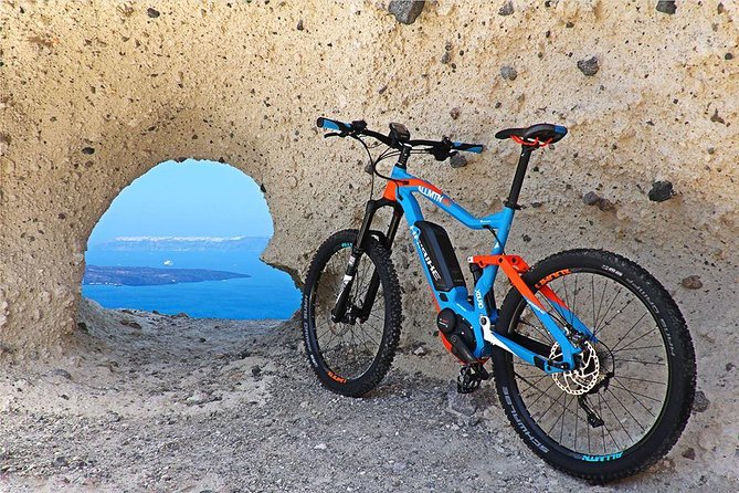 Santorini E-bike Adventures - The Original Bike Tours - The village lanes: what you’ll notice (and why Emporio keeps coming up)