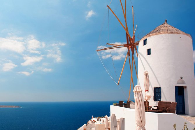 Santorini Highlights and Venetian Castles Small-Group Day Tour - Firostefani photo stop: Blue Dome views and Rock of Skaros context