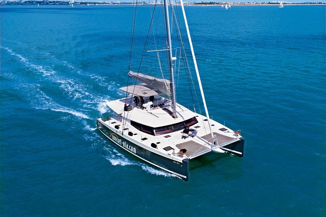 Santorini Luxury Catamaran Day Cruise with BBQ,drinks,transfer - What sailing past the Volcano and Palea Kameni actually feels like