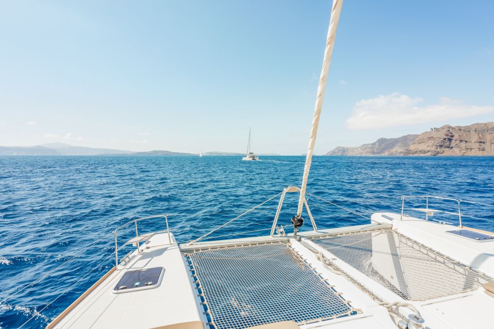Santorini: Luxury Catamaran Day Trip with Meal and Open Bar - Key Facts at a Glance