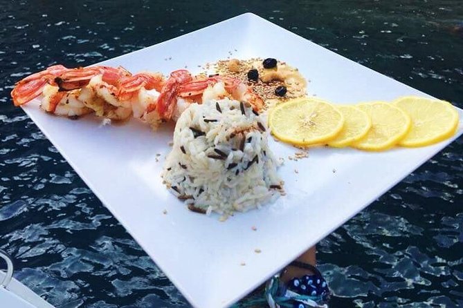 Santorini Luxury Catamaran Sunset Cruise with BBQ, Drink and Transfer - From Oia or Athinios port: boarding the Ipanema 58 in the right mood