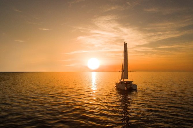Santorini Luxury Catamaran Sunset Cruise with BBQ, Drink and Transfer - Greek BBQ lunch and included drinks: real value if you drink and snack