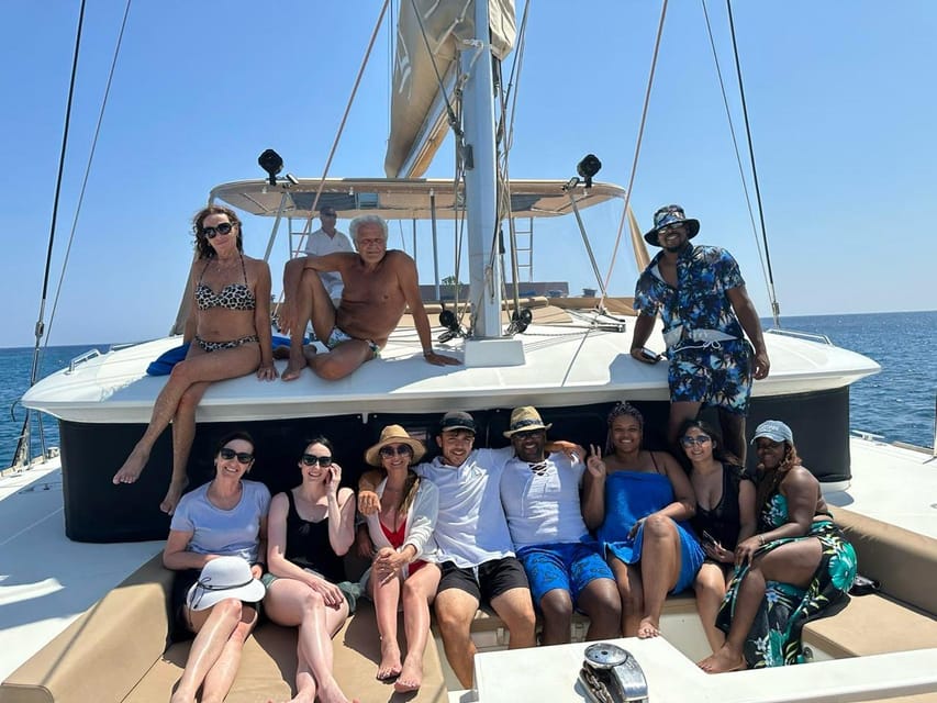 Santorini: Luxury Sunset Cruise with Dinner, BBQ, and Drinks - Transfers, pick-up variety, and the real timeline on the ground