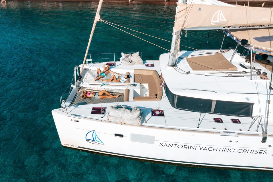 Santorini: Luxury Sunset Cruise with Dinner, BBQ, and Drinks - Palea Kameni hot springs: the sulfur swim has real trade-offs