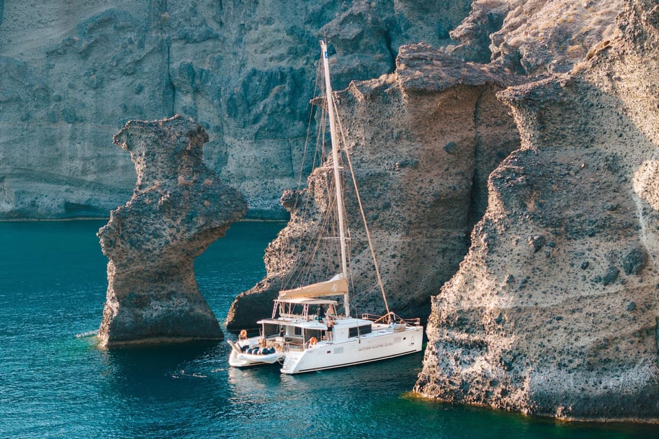 Santorini: Luxury Sunset Cruise with Dinner, BBQ, and Drinks - Thirasia island time: the meal with the best kind of view