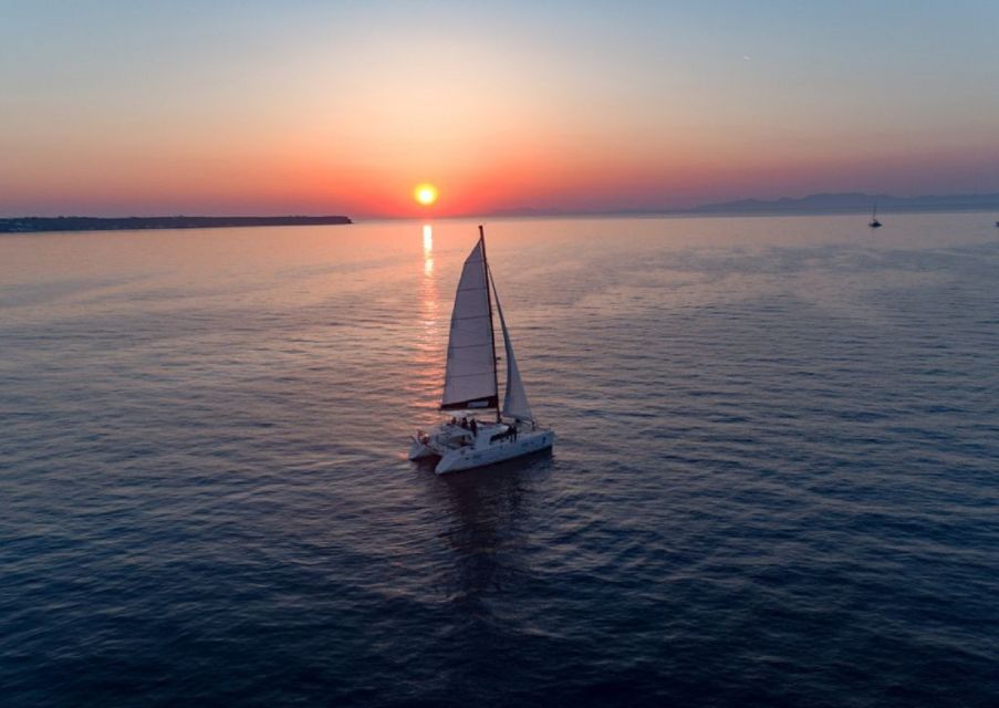 Santorini: Luxury Sunset Cruise with Dinner & Open Bar - Crew energy: the human factor that makes the itinerary feel effortless