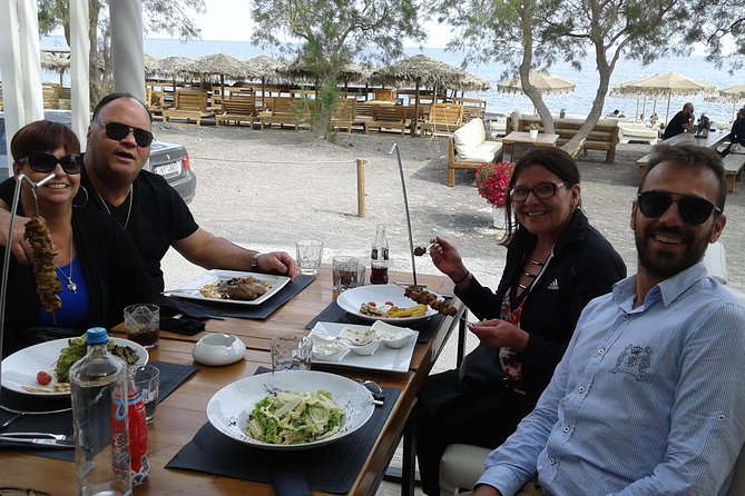 Santorini Popular Destinations - Perivolos Beach for sea time and an easy meal plan
