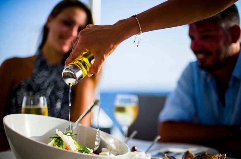 Santorini: Private Catamaran Cruise with BBQ Meal and Drinks - Thirassia and the Manolas View From the Water