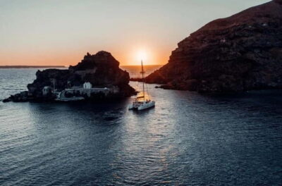 Santorini: Private Catamaran Cruise with BBQ Meal and Drinks - Ammoudi Bay Pickup and the Moment You Step Onto the Catamaran