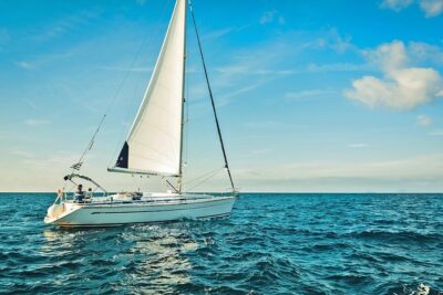 Santorini Private Daytime Sailing Cruise with Meal, Drinks &Transfer included - Volcano Between Two Passages: Hot Springs, Cape Lighthouse, and Caldera Views